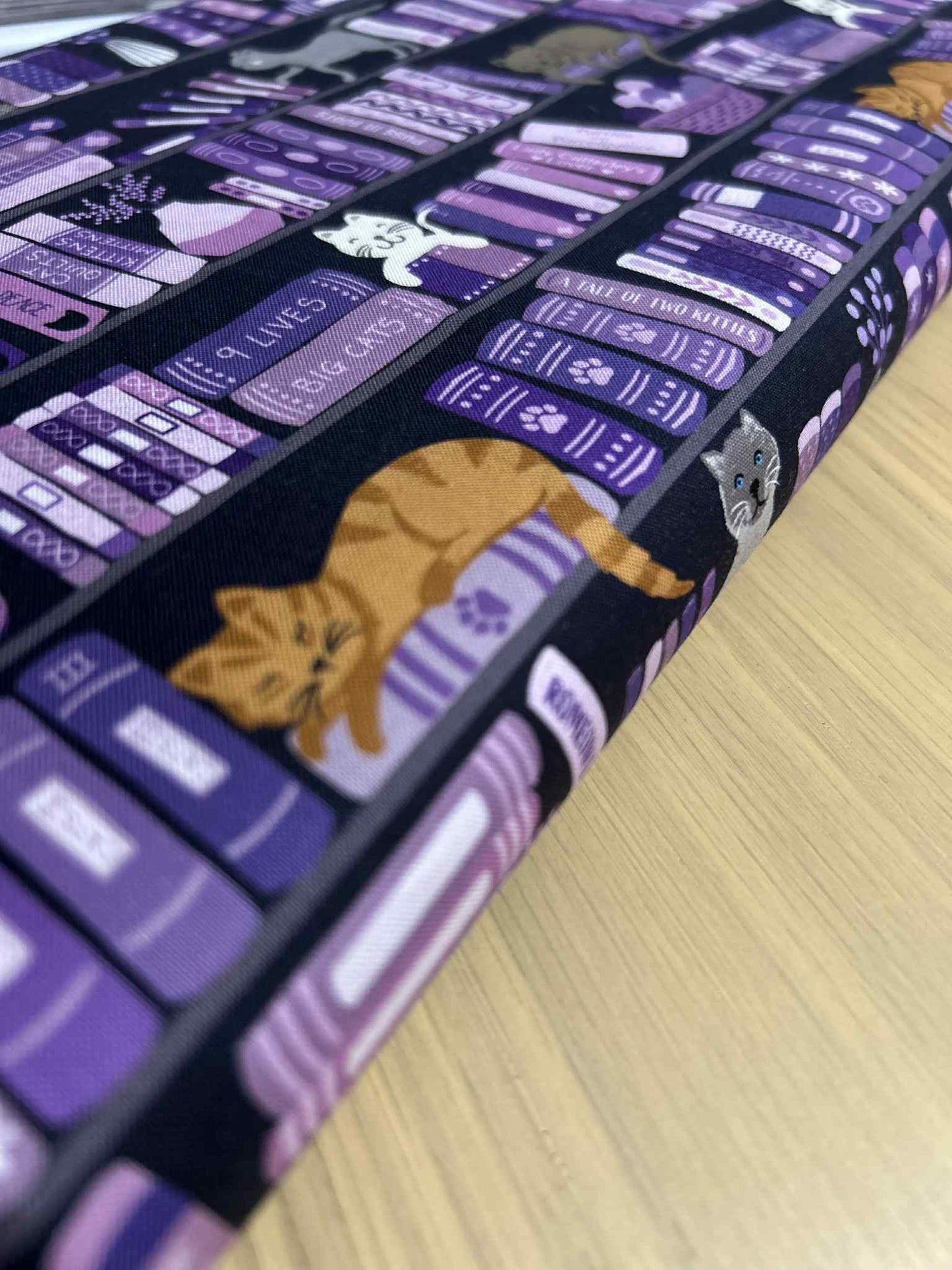 Lewis and Irene- the purfect book club, bookshelves and cats purple