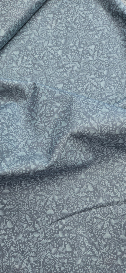 Lewis & Irene Celtic Thistle Duck Egg premium quilting cotton fabric featuring thistle motifs on a soft duck egg background.