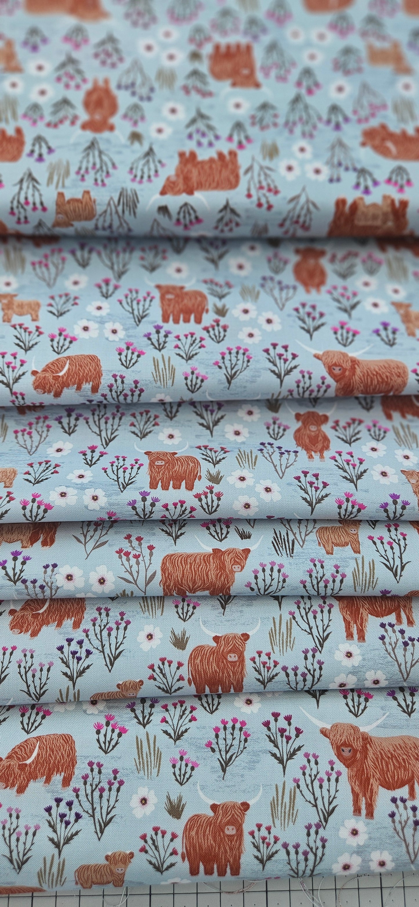 Lewis & Irene Cotton Fabric -Celtic Summers Summer Meadow Highland Cows on Breezy Blue