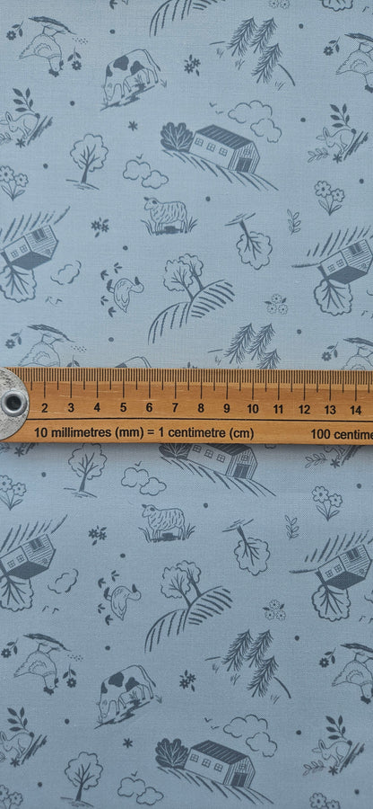 Lewis & Irene Duck Egg Croft premium quilting cotton fabric featuring a countryside-inspired design on a soft duck egg background.