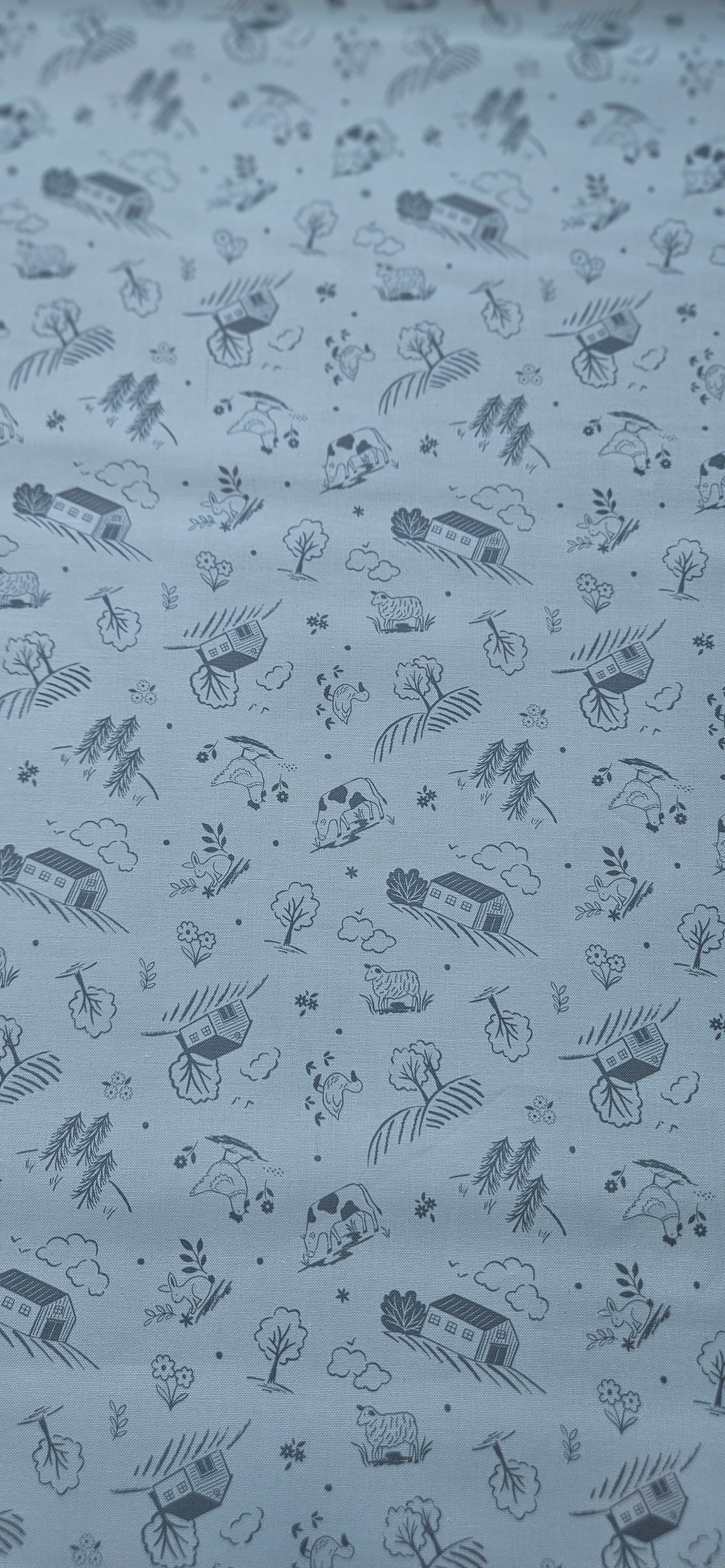 Lewis & Irene Duck Egg Croft premium quilting cotton fabric featuring a countryside-inspired design on a soft duck egg background.