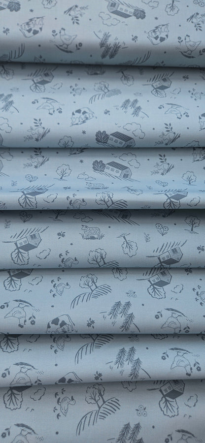 Lewis & Irene Duck Egg Croft premium quilting cotton fabric featuring a countryside-inspired design on a soft duck egg background.