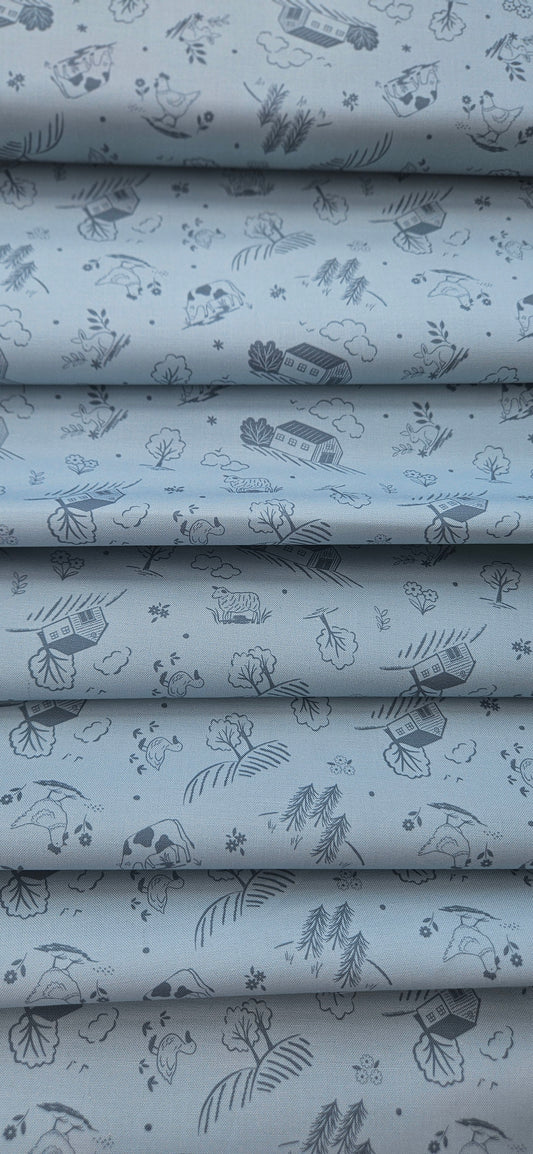 Lewis & Irene Duck Egg Croft premium quilting cotton fabric featuring a countryside-inspired design on a soft duck egg background.