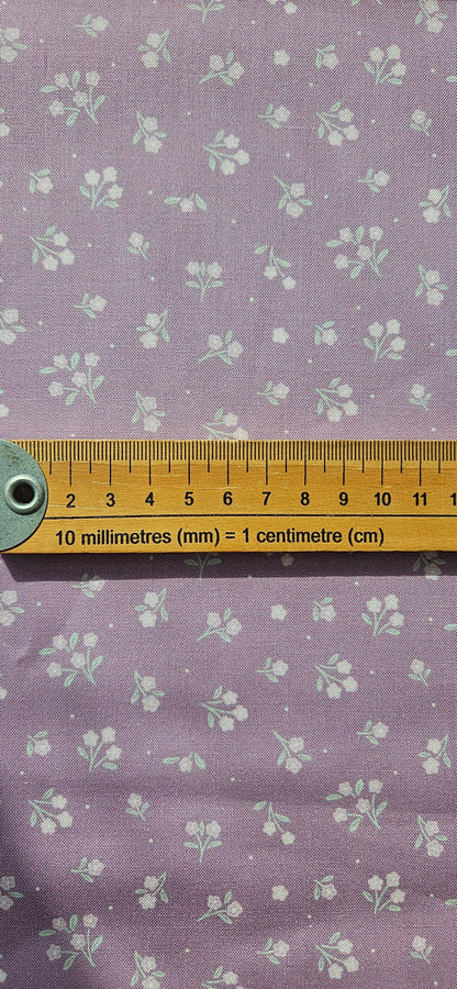 Lewis & Irene Dear Spring Ditsy Dance Purple floral quilting cotton fabric by Cassandra Connolly.