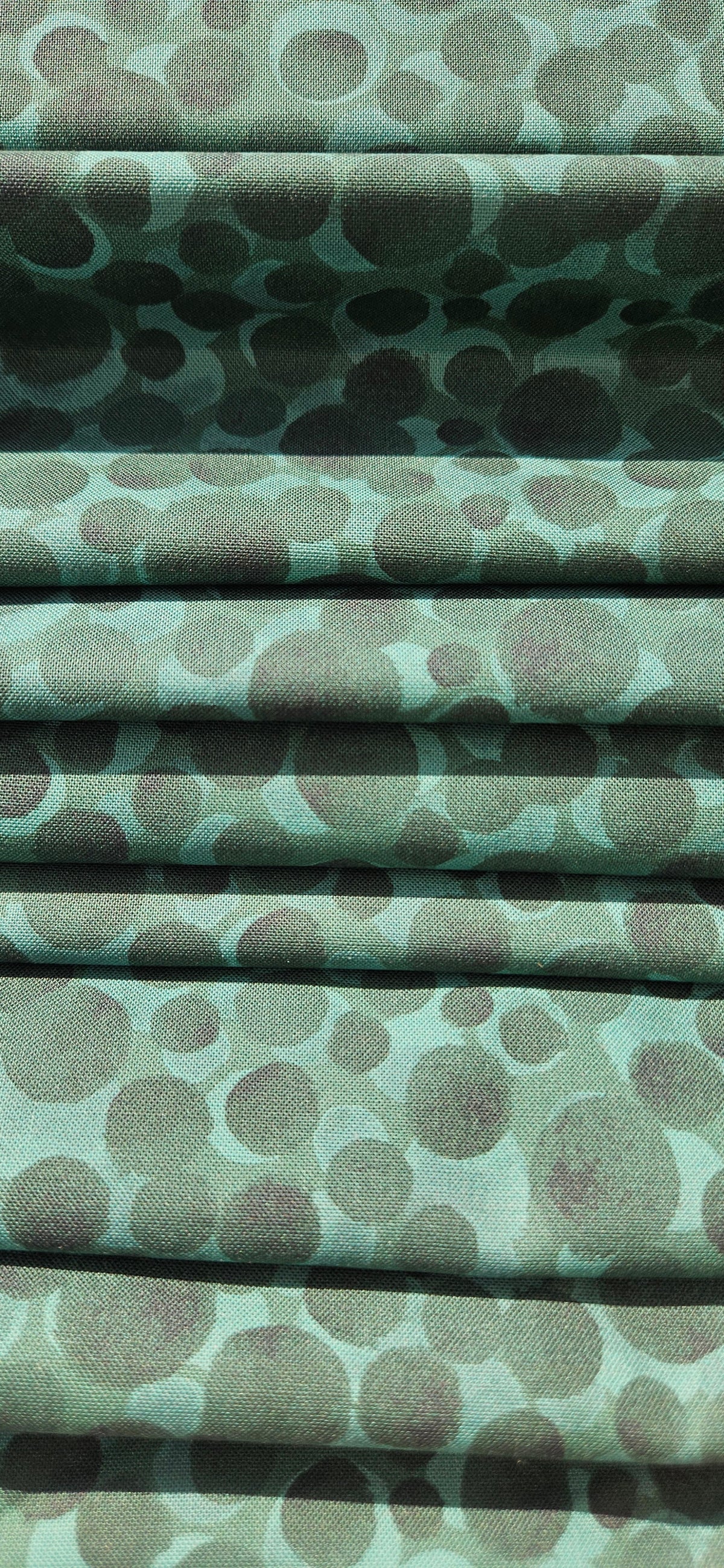 Lewis & Irene Bumbleberries Nordic Green premium quilting cotton blender fabric with a subtle tonal design.