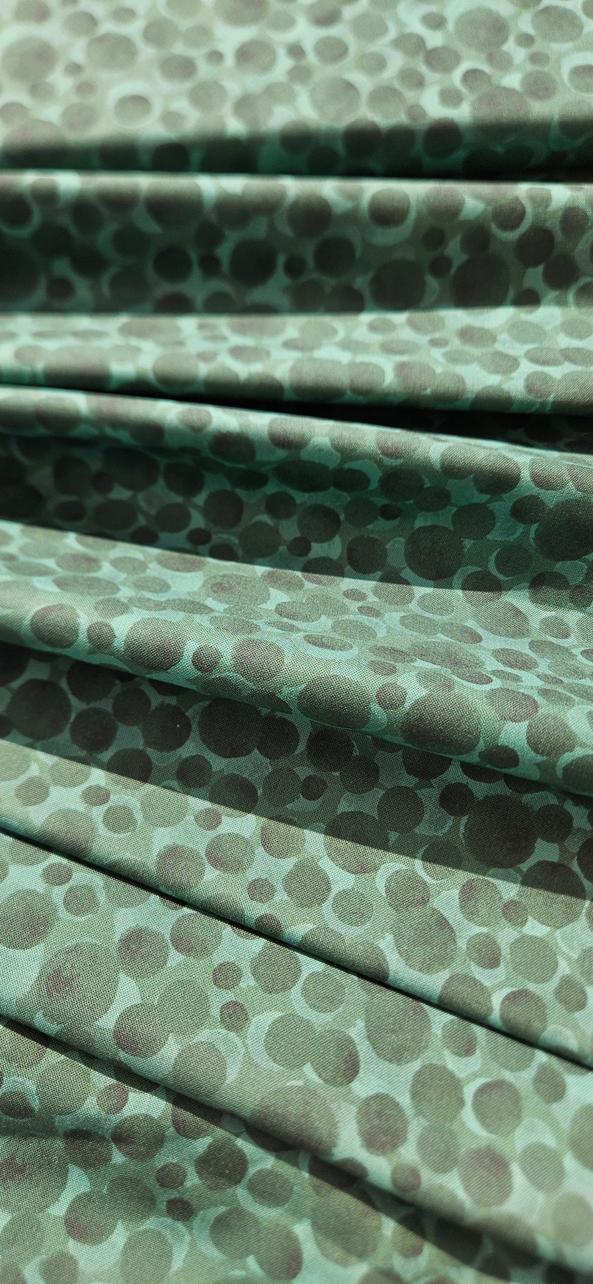 Lewis & Irene Bumbleberries Nordic Green premium quilting cotton blender fabric with a subtle tonal design.