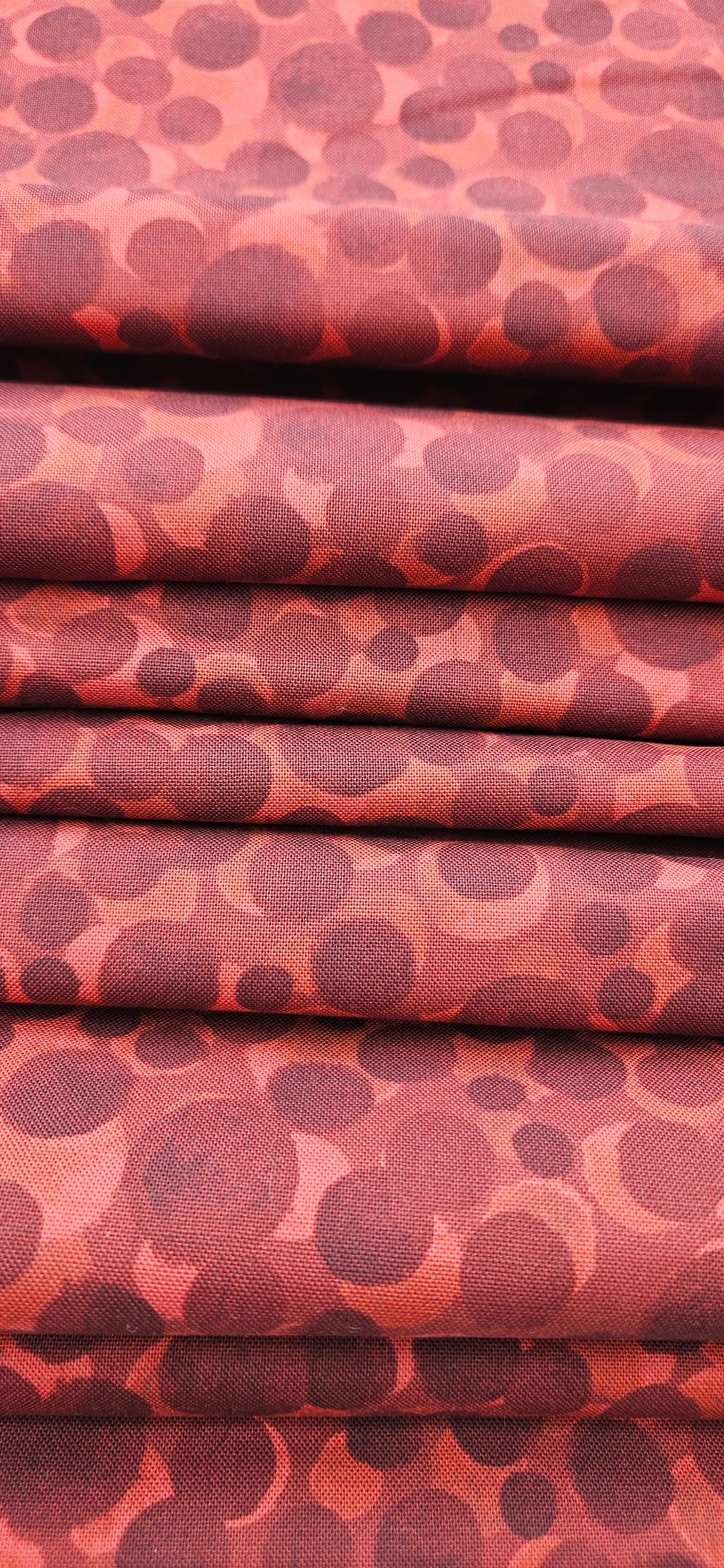 Lewis & Irene Bumbleberries Dark Red premium quilting cotton blender fabric with a subtle tonal design.