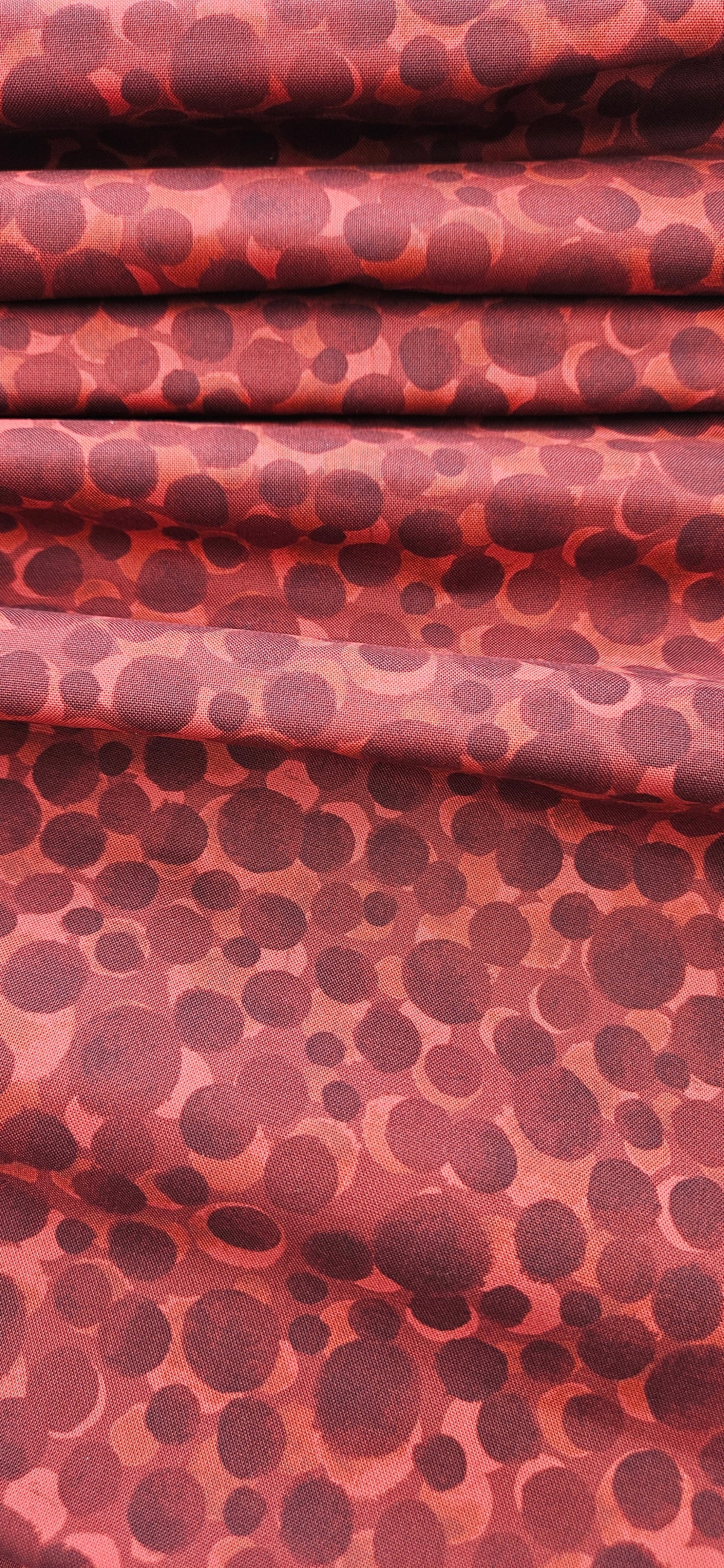 Lewis & Irene Bumbleberries Dark Red premium quilting cotton blender fabric with a subtle tonal design.