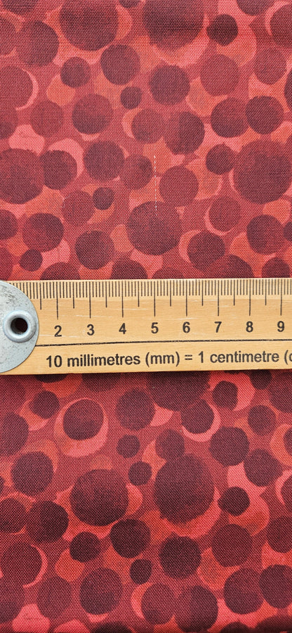 Lewis & Irene Bumbleberries Dark Red premium quilting cotton blender fabric with a subtle tonal design.