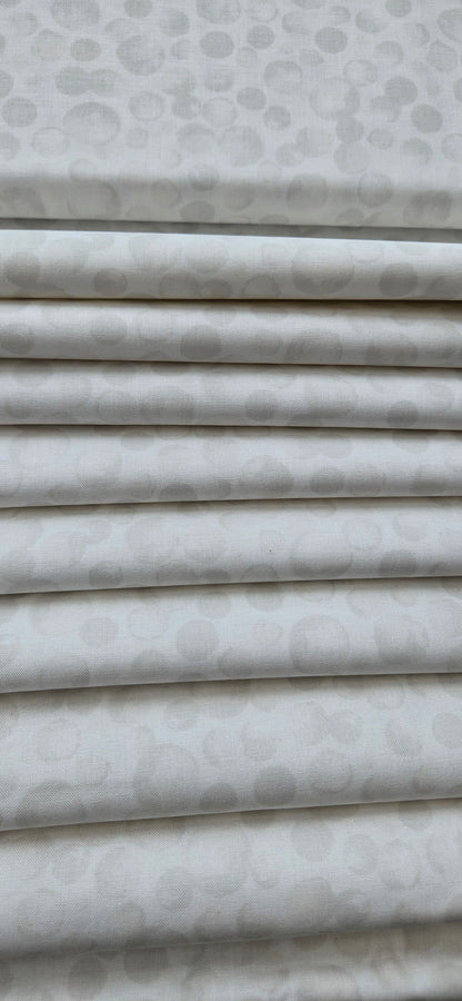Lewis & Irene Bumbleberries White premium quilting cotton blender fabric with a subtle tonal design.