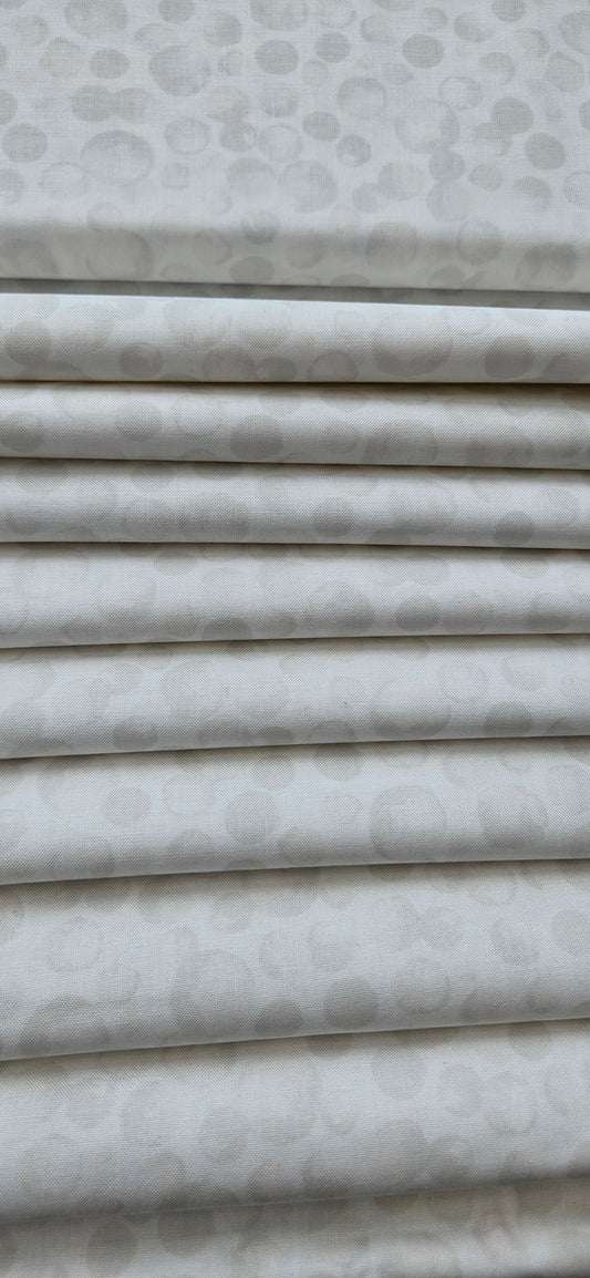 Lewis & Irene Bumbleberries White premium quilting cotton blender fabric with a subtle tonal design.