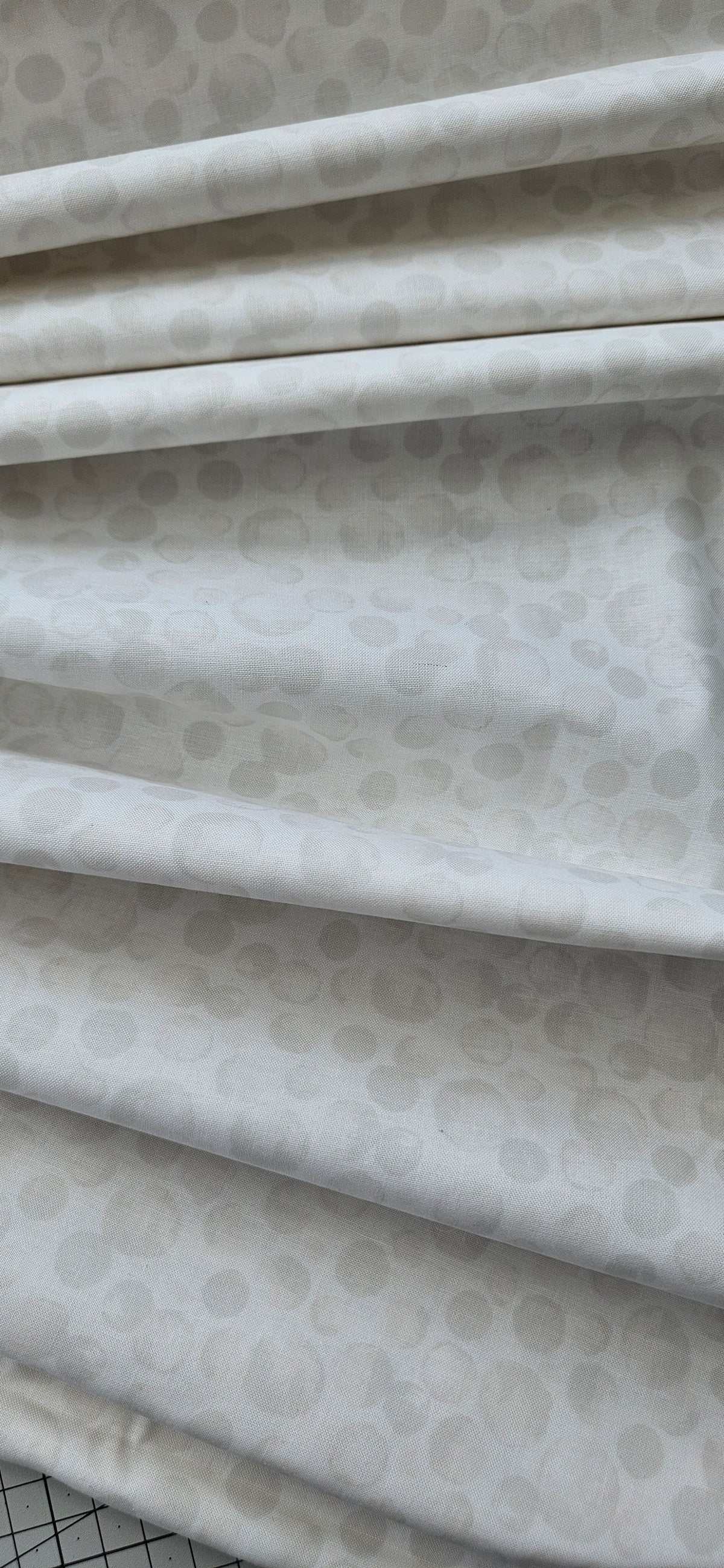Lewis & Irene Bumbleberries White premium quilting cotton blender fabric with a subtle tonal design.