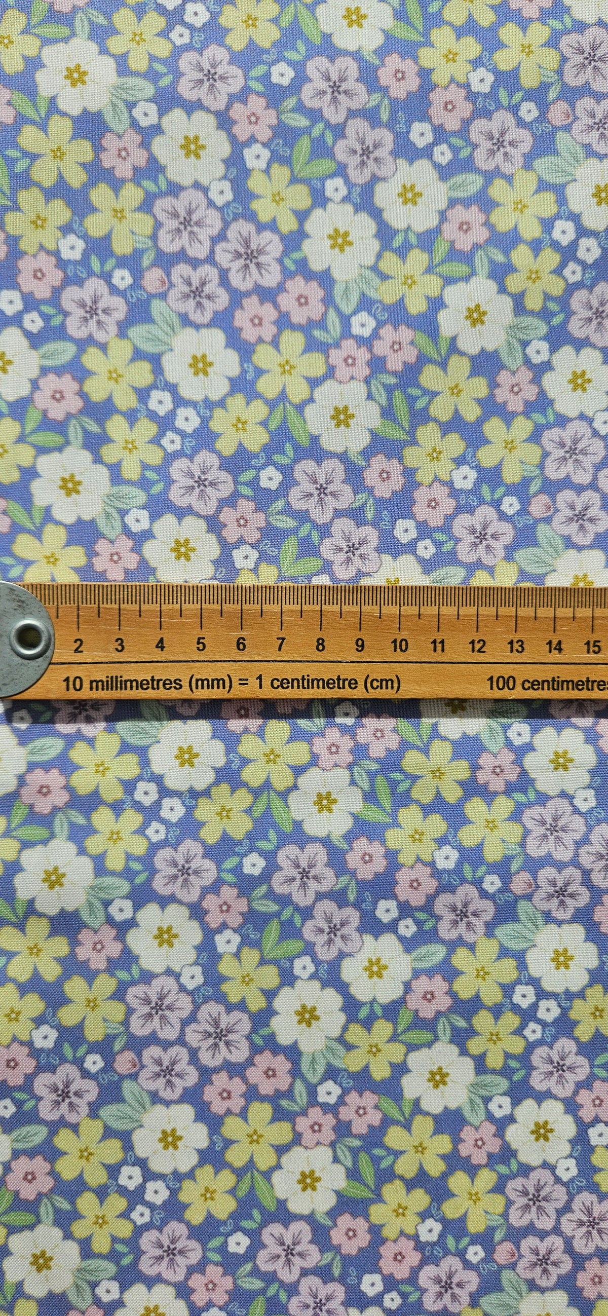 Lewis & Irene Dear Spring Primrose Prairie Dusky Mid Blue floral quilting cotton fabric by Cassandra Connolly.