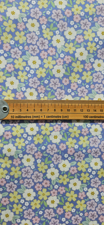 Lewis & Irene Dear Spring Primrose Prairie Dusky Mid Blue floral quilting cotton fabric by Cassandra Connolly.
