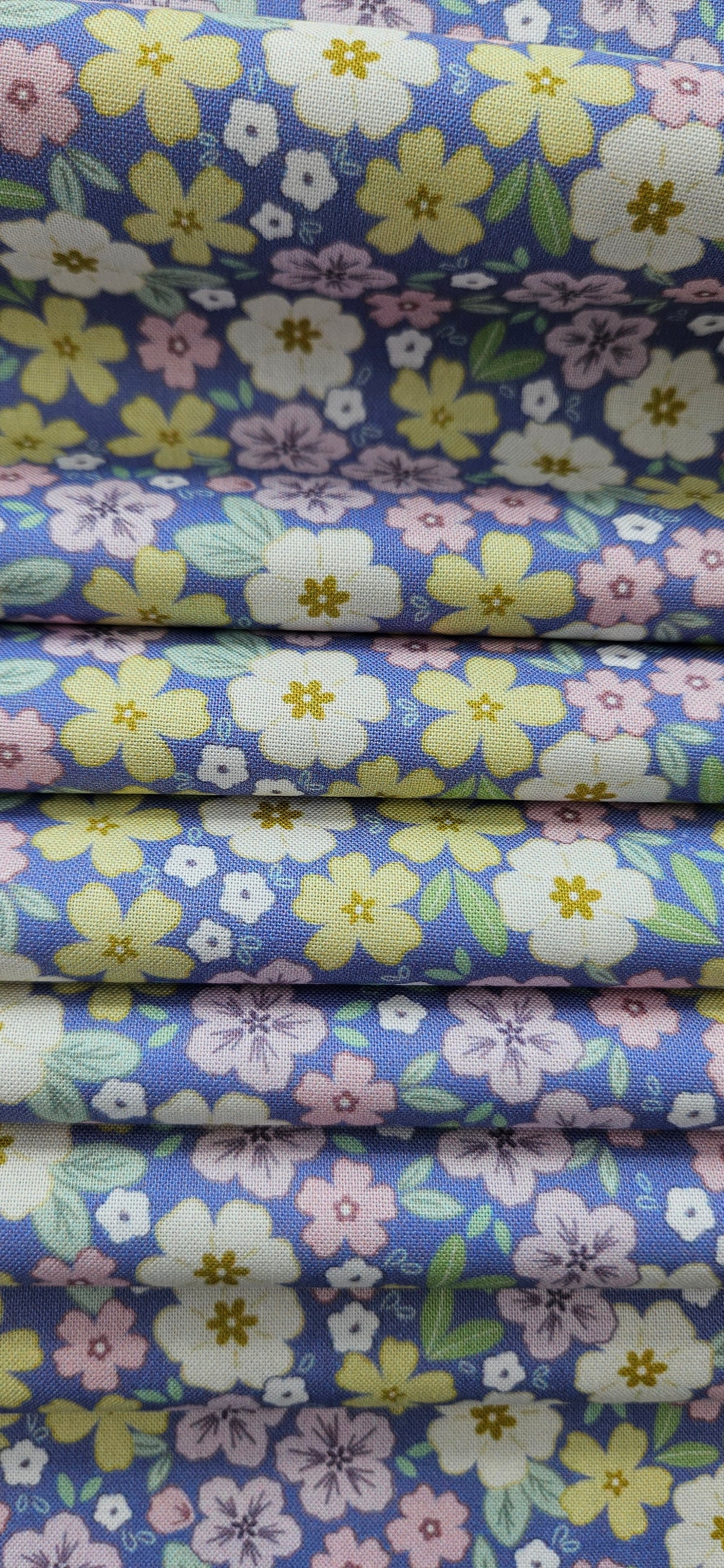 Lewis & Irene Dear Spring Primrose Prairie Dusky Mid Blue floral quilting cotton fabric by Cassandra Connolly.