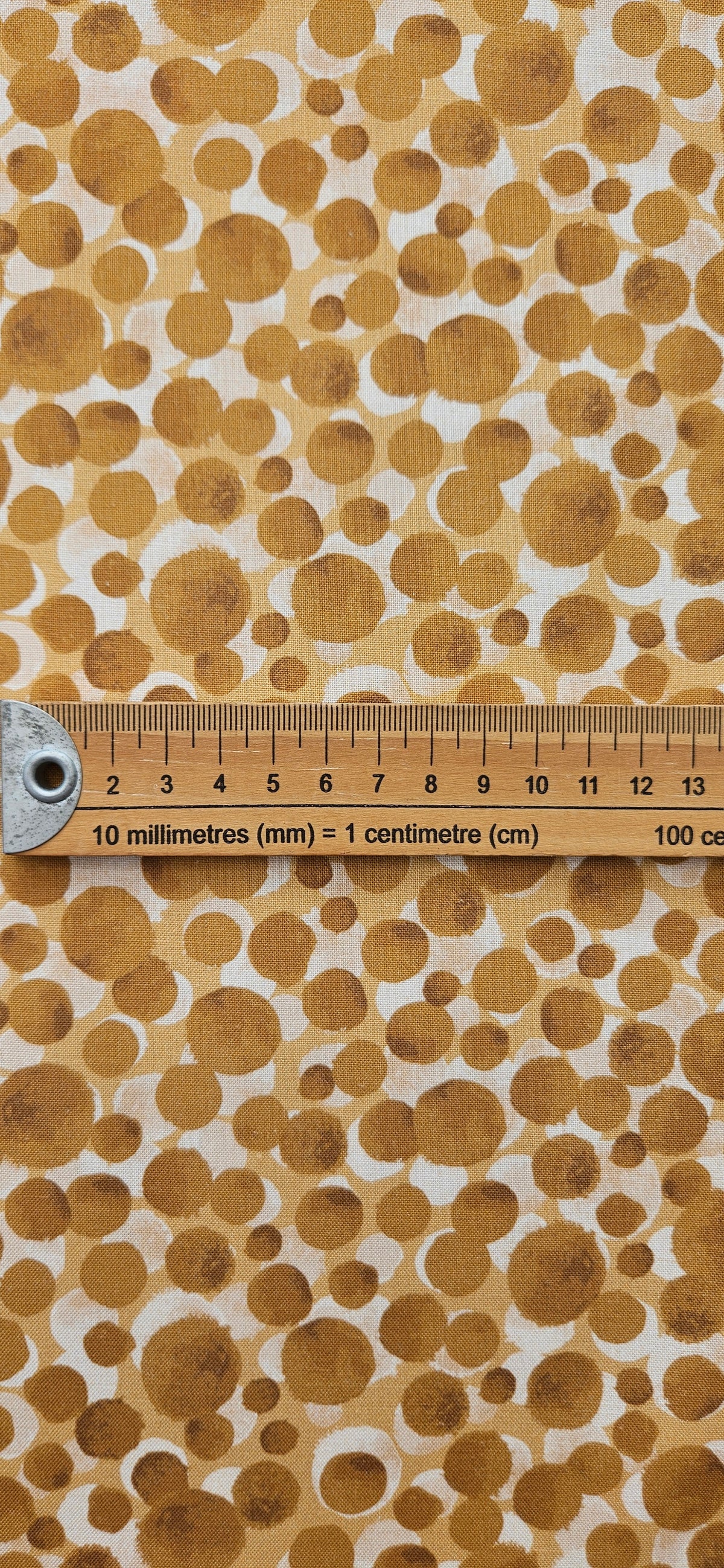 Lewis & Irene Bumbleberries Cream on Gold premium quilting cotton blender fabric in warm cream and golden tones.