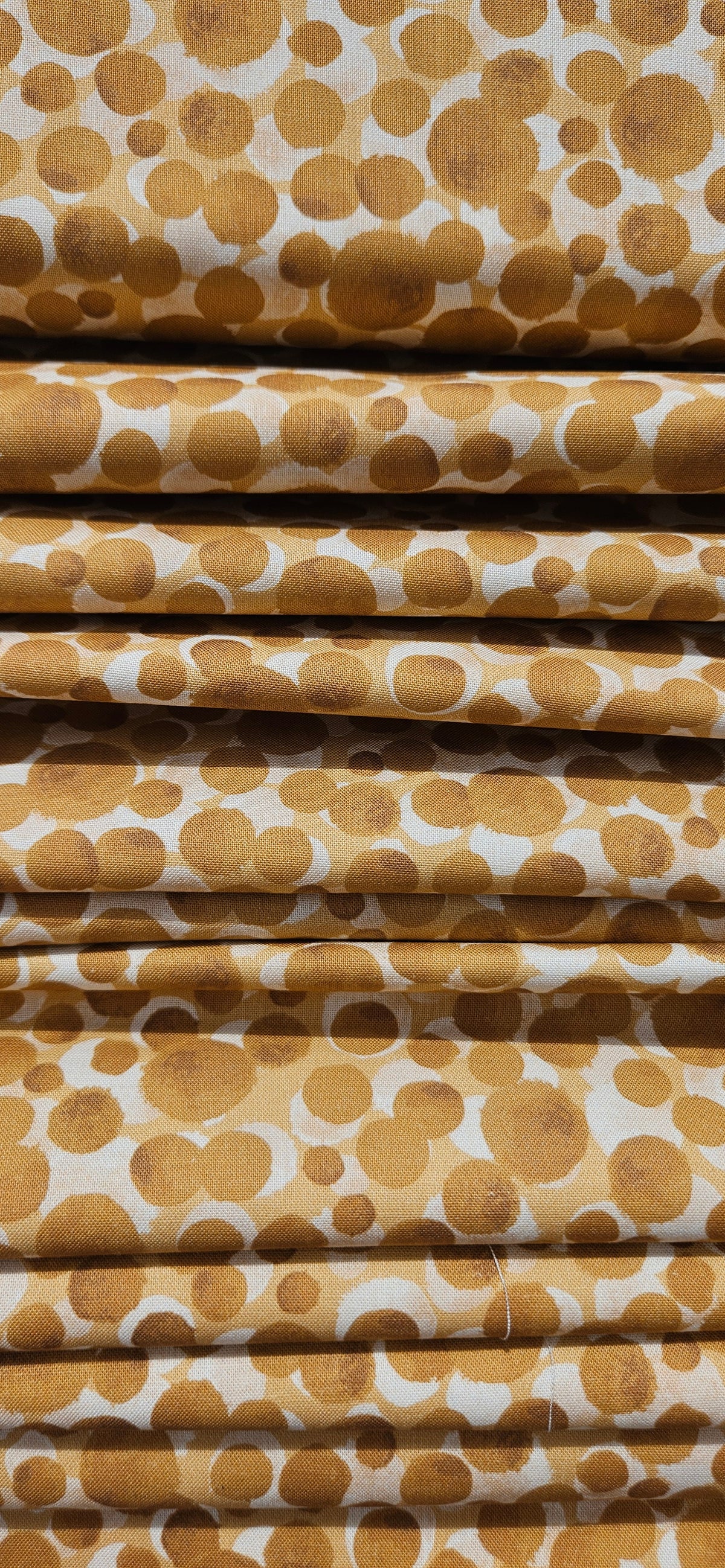 Lewis & Irene Bumbleberries Cream on Gold premium quilting cotton blender fabric in warm cream and golden tones.