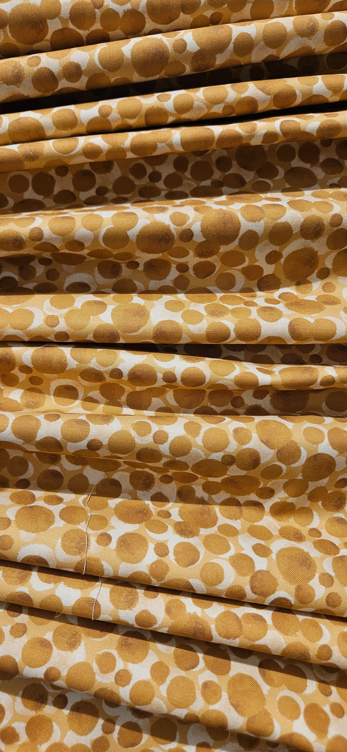 Lewis & Irene Bumbleberries Cream on Gold premium quilting cotton blender fabric in warm cream and golden tones.