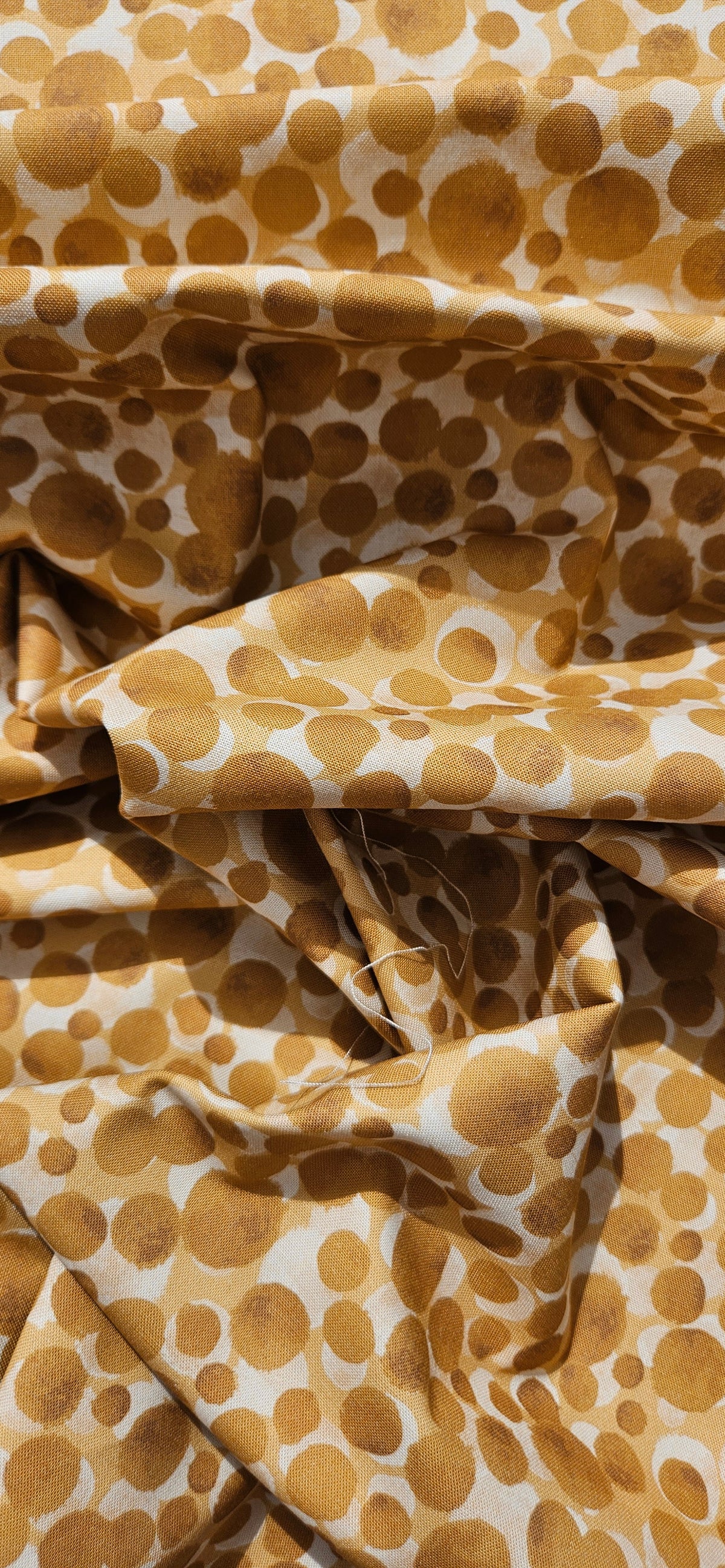 Lewis & Irene Bumbleberries Cream on Gold premium quilting cotton blender fabric in warm cream and golden tones.