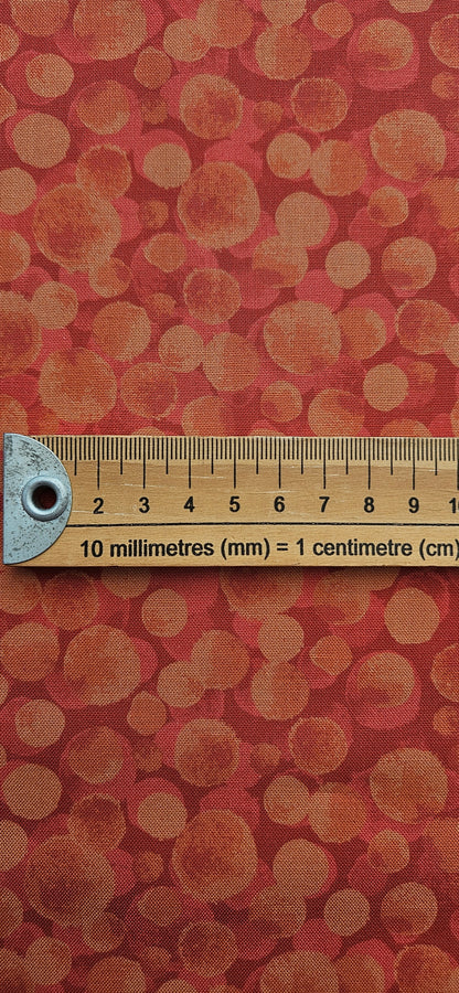 Lewis & Irene Bumbleberries Red Rust premium quilting cotton blender fabric in warm red and rust tones.