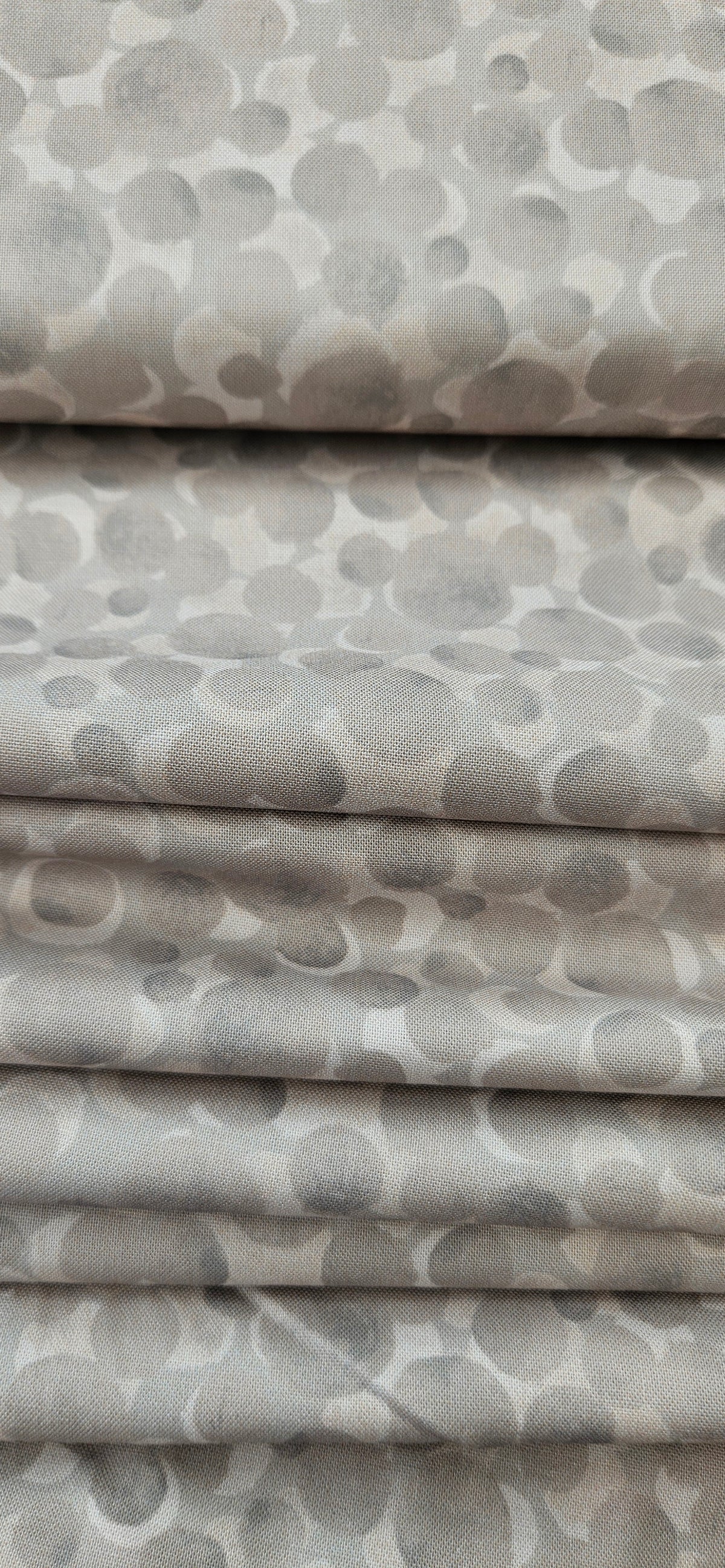 Lewis & Irene Bumbleberries Latte premium quilting cotton blender fabric in warm neutral tones.