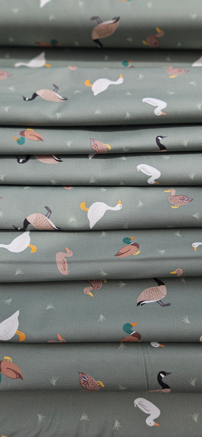 Lewis & Irene Small Things Rivers & Creeks Ducks and Geese on Green premium quilting cotton fabric.