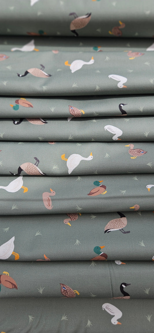 Lewis & Irene Small Things Rivers & Creeks Ducks and Geese on Green premium quilting cotton fabric.