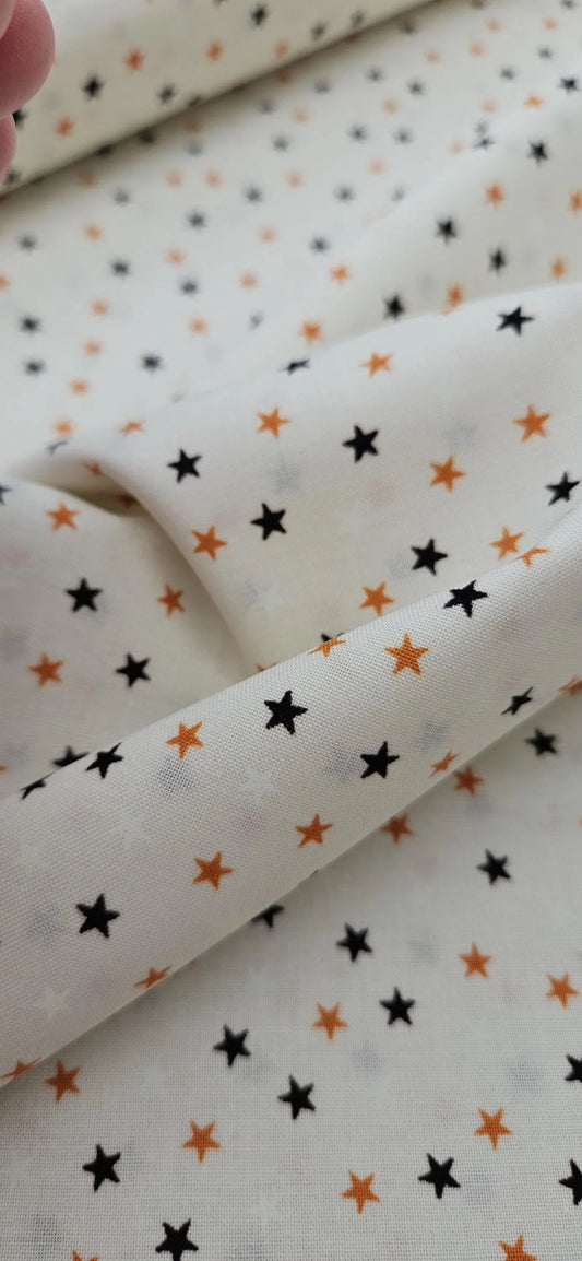 Lewis & Irene Cotton Fabric – Stars on Cream Glow Fabric | Transylvania Glow Collection | Halloween Quilting Fabric | Sold by the Half Metre