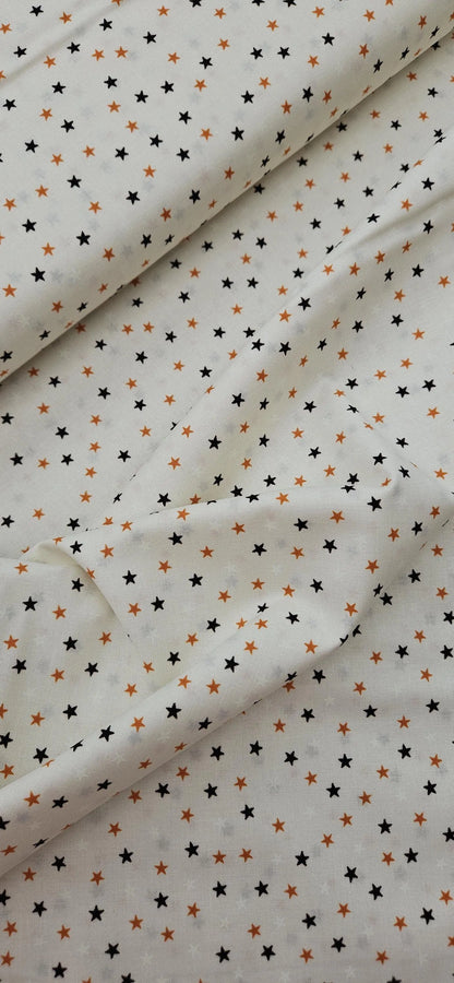Lewis & Irene Cotton Fabric – Stars on Cream Glow Fabric | Transylvania Glow Collection | Halloween Quilting Fabric | Sold by the Half Metre