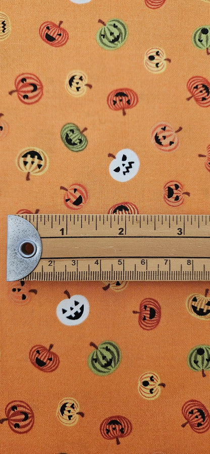 Halloween Cotton Fabric – Scattered Jack-o'-Lantern Pumpkins on Orange | 100% Cotton Quilting Fabric