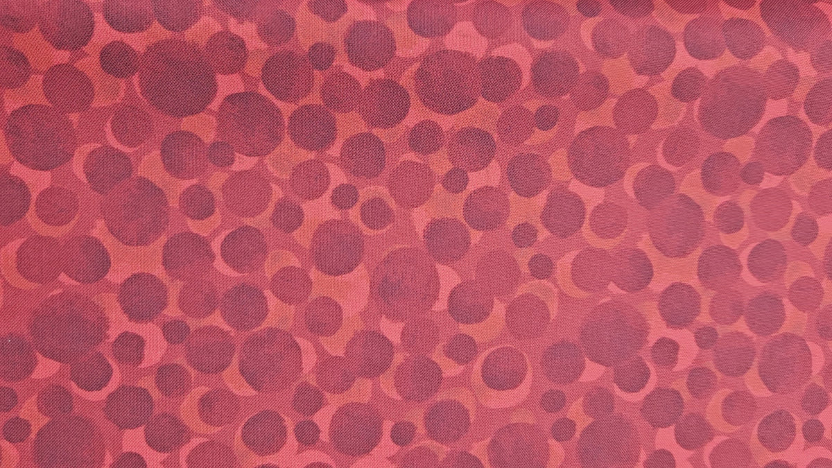Lewis & Irene Bumbleberries Dark Red premium quilting cotton blender fabric with a subtle tonal design.